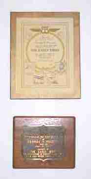 Plaques from his grandson, George Prudden, 2001